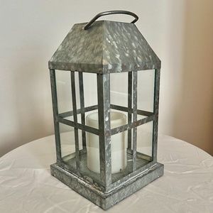 Galvanized lantern with artificial candle